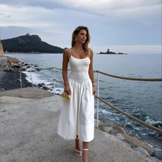 Cass Dimicco in a white dress