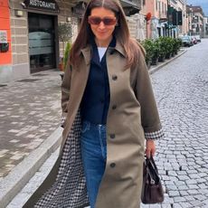 Fashion editor, Judith Jones in blazer and trench coat