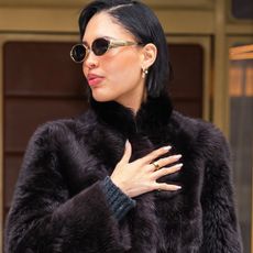 NEW YORK, NEW YORK - FEBRUARY 02: Nara Smith is seen in SoHo on February 02, 2025 in New York City wearing a fur coat, black trousers, and patent leather Chanel flats. 